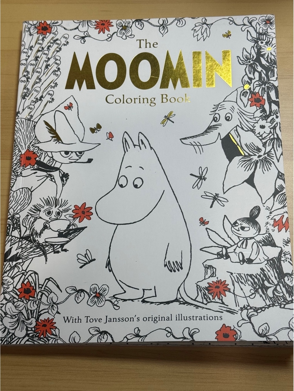 The Moomin Coloring Book with gold foil cover edition